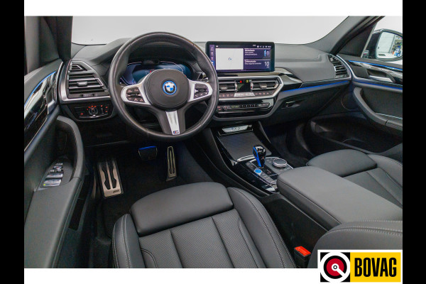 BMW iX3 M-Sport Shadowline 80 kWh 286 PK | Pano | Leer | Elect. stoelen best. met geh. | Camera | Parkeerassistent pakket Licht- en regensensor, PDC, Sportstoelen, Stoelverwarming, Led, Camera, Privacy glas