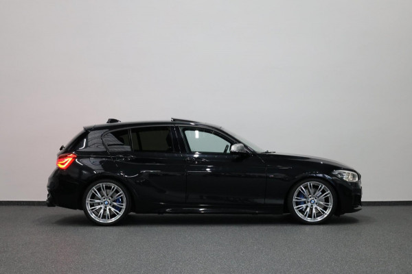 BMW 1-serie M140i xDrive MAXTON/LED/SCHUIFDAK/HARMAN/LEER+S.VERWARMING/19" LMV/CAM/CRUISE/ECC/12 MND GARANTIE!