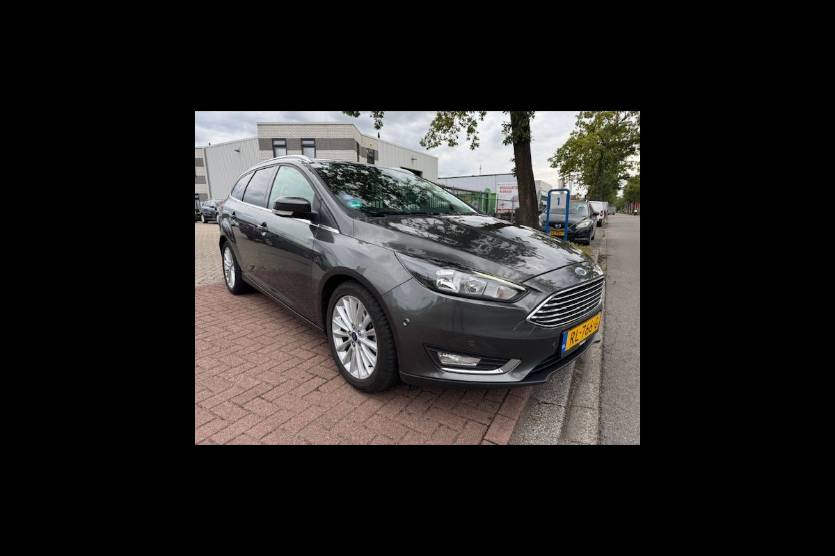 Ford FOCUS Wagon 1.0 125pk Titanium 162.000km Airco/ECC,Cruisecontrol,Navigatie Ford FOCUS Wagon 1.0 125pk Titanium 162.000km Airco/ECC,Cruisecontrol,Navigatie