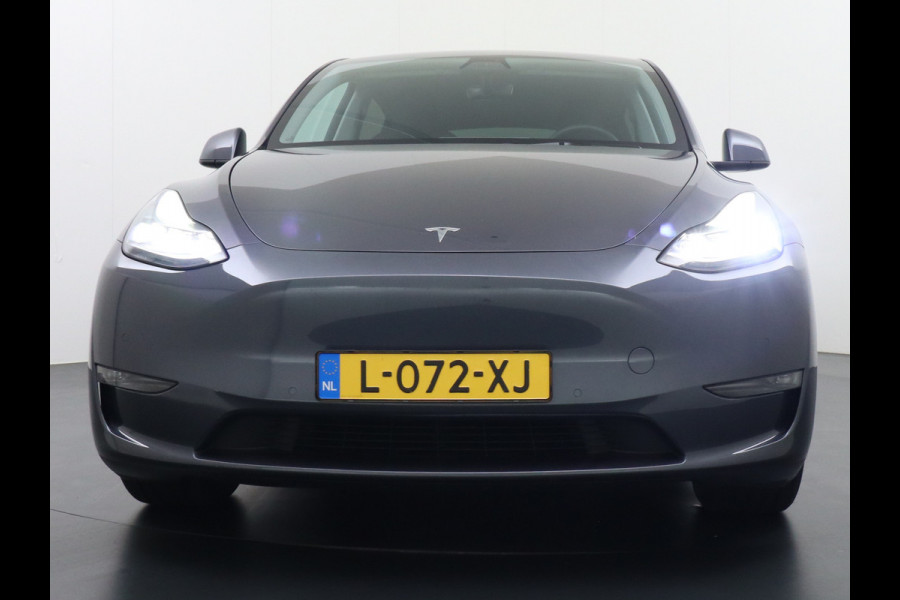 Tesla Model Y Long Range AWD 75kWh Trekhaak Warmtepomp Navi Ecc Leder Camera Privacy Glas Matrix-Led Keyless Stoel+stuurverwarming 1.600 kg Trekgewicht 1e Eigenaar Garantie Batterij en aandrijflijn jaar/192.000km vanaf nieuw