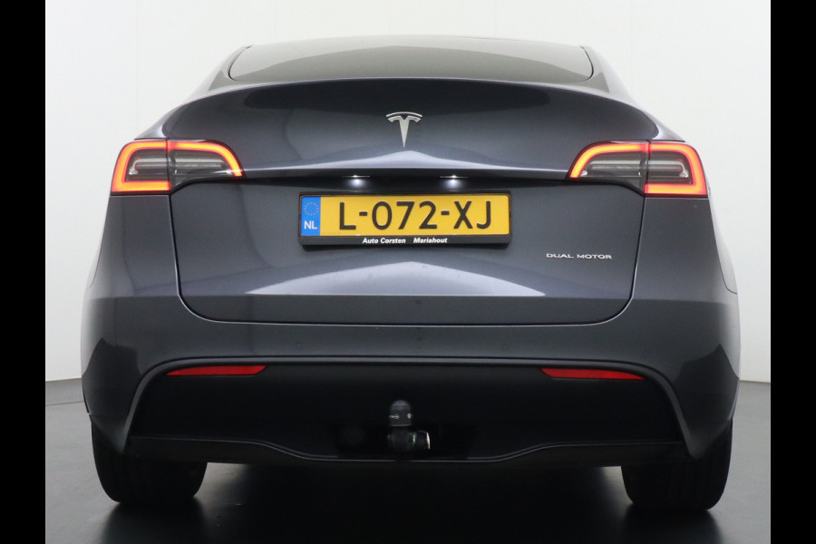Tesla Model Y Long Range AWD 75kWh Trekhaak Warmtepomp Navi Ecc Leder Camera Privacy Glas Matrix-Led Keyless Stoel+stuurverwarming 1.600 kg Trekgewicht 1e Eigenaar Garantie Batterij en aandrijflijn jaar/192.000km vanaf nieuw