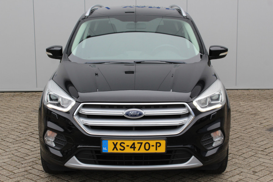 Ford Kuga 1.5-150pk EcoBoost Titanium. Trekgewicht 2.000kg ! Autm. airco dual, stoel-, stuur- en voorraamverwarming, cruise control, telefoonvoorb., navigatie, Sony soundsyst., LM wielen, trekhaak, privacy glass, All Season banden etc.