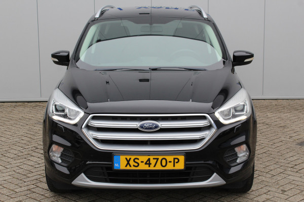 Ford Kuga 1.5-150pk EcoBoost Titanium. Trekgewicht 2.000kg ! Autm. airco dual, stoel-, stuur- en voorraamverwarming, cruise control, telefoonvoorb., navigatie, Sony soundsyst., LM wielen, trekhaak, privacy glass, All Season banden etc.
