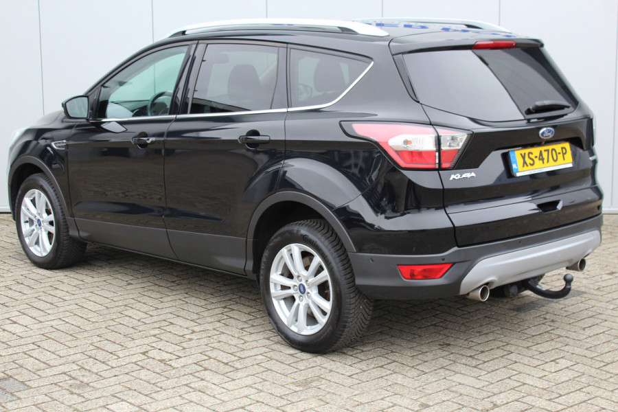 Ford Kuga 1.5-150pk EcoBoost Titanium. Trekgewicht 2.000kg ! Autm. airco dual, stoel-, stuur- en voorraamverwarming, cruise control, telefoonvoorb., navigatie, Sony soundsyst., LM wielen, trekhaak, privacy glass, All Season banden etc.