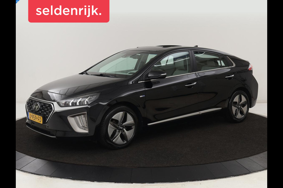 Hyundai IONIQ 1.6 GDi Premium + | Schuifdak | Apple Carplay | LED | Navigatie | Stuur & Stoelverwarming | Leder | Sfeerverlichting Hyundai IONIQ 1.6 GDi Premium + | Schuifdak | Apple Carplay | LED | Navigatie | Stuur & Stoelverwarming | Leder | Sfeerverlichting