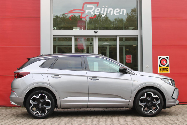 Opel Grandland 1.2 Turbo 130PK AUTOMAAT ULTIMATE | STOEL/STUUR/VOORRUIT VERWARMING | ACHTRERUITRIJ CAMERA | DODEHOEK DETECTIE | ELEKTRISCH BEDIENBARE ACHTERKLEP | FULL LED MATRIX KOPLAMPEN | NAVIGATIE | 19" LICHTMETALEN VELGEN | ALCANTARA BEKLEDING | APPLE CARPLAY/ANDROID AUTO | DRAADLOZE TELEFOONLADER | KEYLESS ENTRY/START | BLACK PACK | ADAPTIVE CRUISE CONTROL | COMFORT STOELEN |