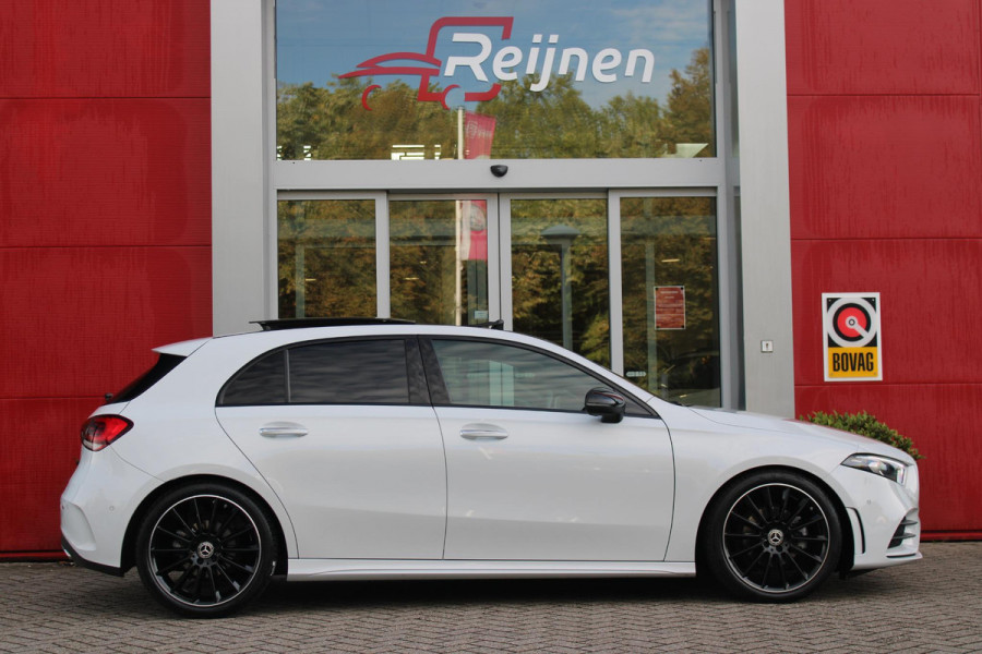 Mercedes-Benz A-Klasse 180 136PK AUTOMAAT AMG LINE | STERRENHEMEL! | PANORAMISCH SCHUIF/KANTEL DAK | SFEER VERLICHTING | NAVIGATIE | ACHTERUITRIJ CAMERA | PARKEERSENSOREN VOOR EN ACHTER | HIGH PERFORMANCE LED KOPLAMPEN | STOEL VERWARMING | KEYLESS - GO | SPIEGEL PAKKET | NIGHT PAKKET | LICHTMETALEN VELGEN 19" | EERSTE EIGENAAR! |