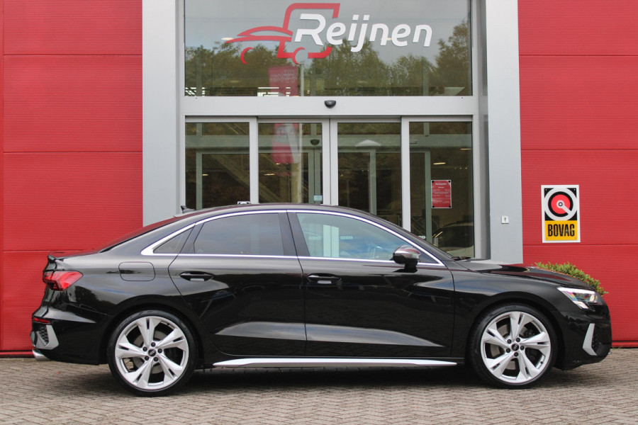 Audi A3 Limousine 2.0 TFSI 310PK S3 QUATTRO | APPLE CARPLAY/ANDROID AUTO | STOEL VERWARMING | S-LINE INTERIEUR/EXTERIEUR | SPORT STUUR S-LINE MET SCHAKEL FUNCTIE | NAVIGATIE | VIRTUAL COCKPIT PLUS | GLANS PAKKET | CRUISE CONTROL | ADVANCED KEY | AMBIENTE VERLICHTING | LANE ASSIST | CLIMATE CONTROL | FULL LED KOPLAMPEN | SPORT STOELEN | PARKEER SENSOREN ACHTER | S SPORTONDERSTEL | S REMMEN | DRAADLOZE TELEFOONLADER |