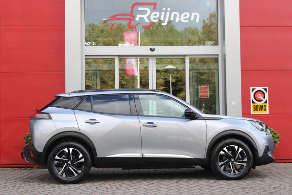 Peugeot 2008 1.2 130PK AUTOMAAT ALLURE PACK | TREKHAAK | NAVIGATIE | APPLE CARPLAY/ANDROID AUTO | ACHTERUITRIJ CAMERA | 3-D COCKPIT | CRUISE CONTROL | CLIMATE CONTROL | LED KOPLAMPEN | LICHTMETALEN VELGEN 17" | NAVIGATIE | DAB+ RADIO |