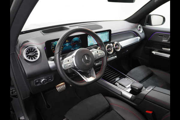 Mercedes-Benz EQB 250 AMG Line 7p. 67 kWh VAN: 38.900,- VOOR: 35.877,- UW HERFSTVOORDEEL: 3.023,- PANORAMADAK | ELECTR STOELEN+geheugen | AMBILIGHT | ADAPTIVE CRUISE | HEAD UP | MEGA COMPLEET!