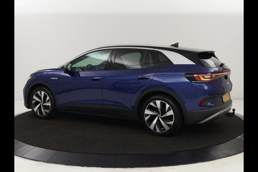 Volkswagen ID.4 First 77 kWh | Trekhaak | Sfeerverlichting | Camera | Navigatie | Stoelverwarming | Carplay | LMV 20 inch | LED | Cruise Control | Getint glas | Climate controle