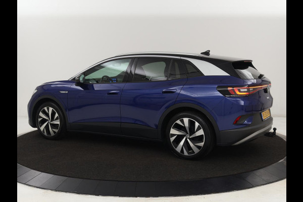 Volkswagen ID.4 First 77 kWh | Trekhaak | Sfeerverlichting | Camera | Navigatie | Stoelverwarming | Carplay | LMV 20 inch | LED | Cruise Control | Getint glas | Climate controle