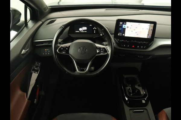 Volkswagen ID.4 First 77 kWh | Trekhaak | Sfeerverlichting | Camera | Navigatie | Stoelverwarming | Carplay | LMV 20 inch | LED | Cruise Control | Getint glas | Climate controle