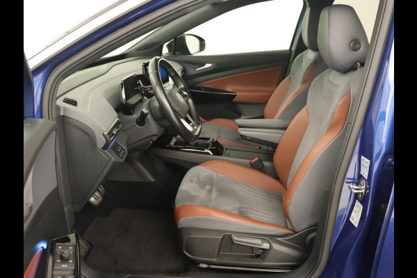 Volkswagen ID.4 First 77 kWh | Trekhaak | Sfeerverlichting | Camera | Navigatie | Stoelverwarming | Carplay | LMV 20 inch | LED | Cruise Control | Getint glas | Climate controle