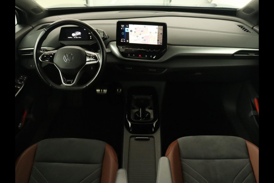 Volkswagen ID.4 First 77 kWh | Trekhaak | Sfeerverlichting | Camera | Navigatie | Stoelverwarming | Carplay | LMV 20 inch | LED | Cruise Control | Getint glas | Climate controle