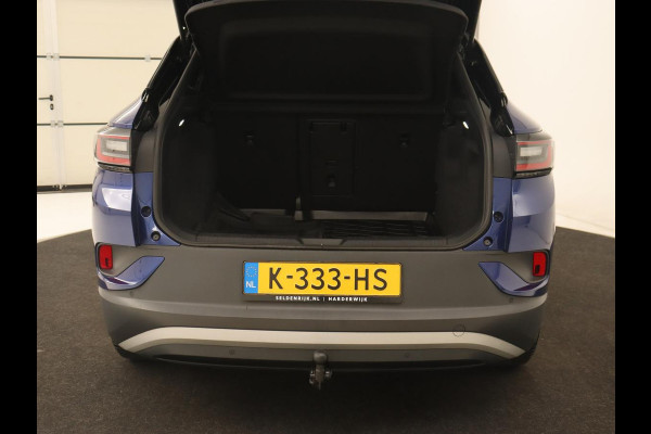 Volkswagen ID.4 First 77 kWh | Trekhaak | Sfeerverlichting | Camera | Navigatie | Stoelverwarming | Carplay | LMV 20 inch | LED | Cruise Control | Getint glas | Climate controle