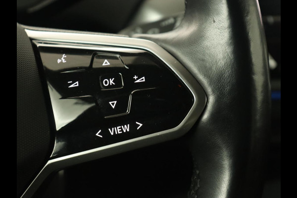 Volkswagen ID.4 First 77 kWh | Trekhaak | Sfeerverlichting | Camera | Navigatie | Stoelverwarming | Carplay | LMV 20 inch | LED | Cruise Control | Getint glas | Climate controle