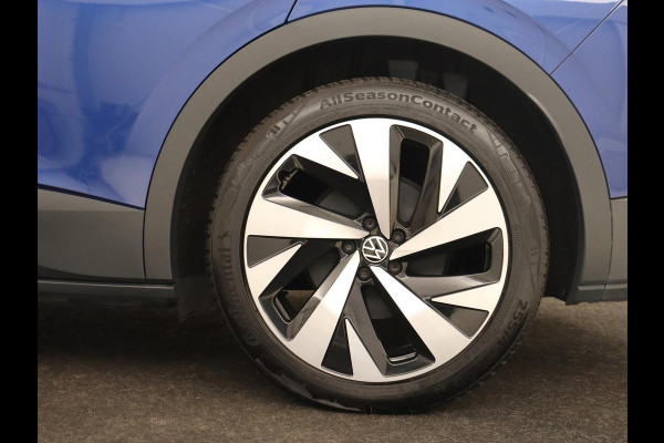 Volkswagen ID.4 First 77 kWh | Trekhaak | Sfeerverlichting | Camera | Navigatie | Stoelverwarming | Carplay | LMV 20 inch | LED | Cruise Control | Getint glas | Climate controle