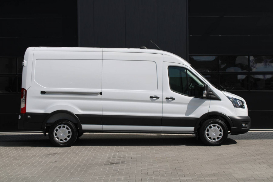 Ford Transit 350 2.0 TDCI L3H2 Trend 130pk - Cruise Control - DAB radio - Verwarmde Vooruit - Parkeersensoren - Rijklaar Ford Transit 350 2.0 TDCI L3H2 Trend 130pk - Cruise Control - DAB radio - Verwarmde Vooruit - Parkeersensoren - Rijklaar