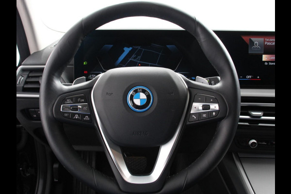 BMW 3 Serie Touring 320e Climate control Adaptive cruise control Parkeersensoren Navigatie LED Apple Carplay/ Android Auto