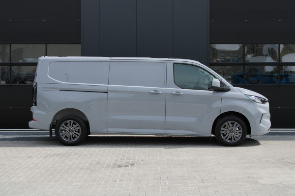 Ford Transit Custom 320 2.0 TDCI L2H1 Limited 150pk - 2x Schuifdeur - Adaptive Cruise - Verwarmd stuur - Blind spot - Navigatie - Camera - Draadloos Ford Transit Custom 320 2.0 TDCI L2H1 Limited 150pk - 2x Schuifdeur - Adaptive Cruise - Verwarmd stuur - Blind spot - Navigatie - Camera - Draadloos