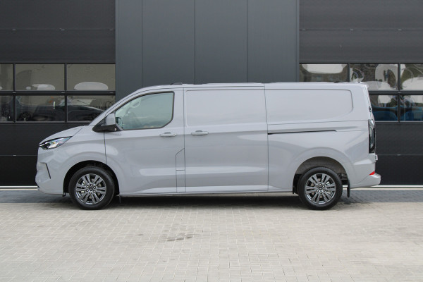 Ford Transit Custom 320 2.0 TDCI L2H1 Limited 150pk - 2x Schuifdeur - Adaptive Cruise - Verwarmd stuur - Blind spot - Navigatie - Camera - Draadloos Ford Transit Custom 320 2.0 TDCI L2H1 Limited 150pk - 2x Schuifdeur - Adaptive Cruise - Verwarmd stuur - Blind spot - Navigatie - Camera - Draadloos