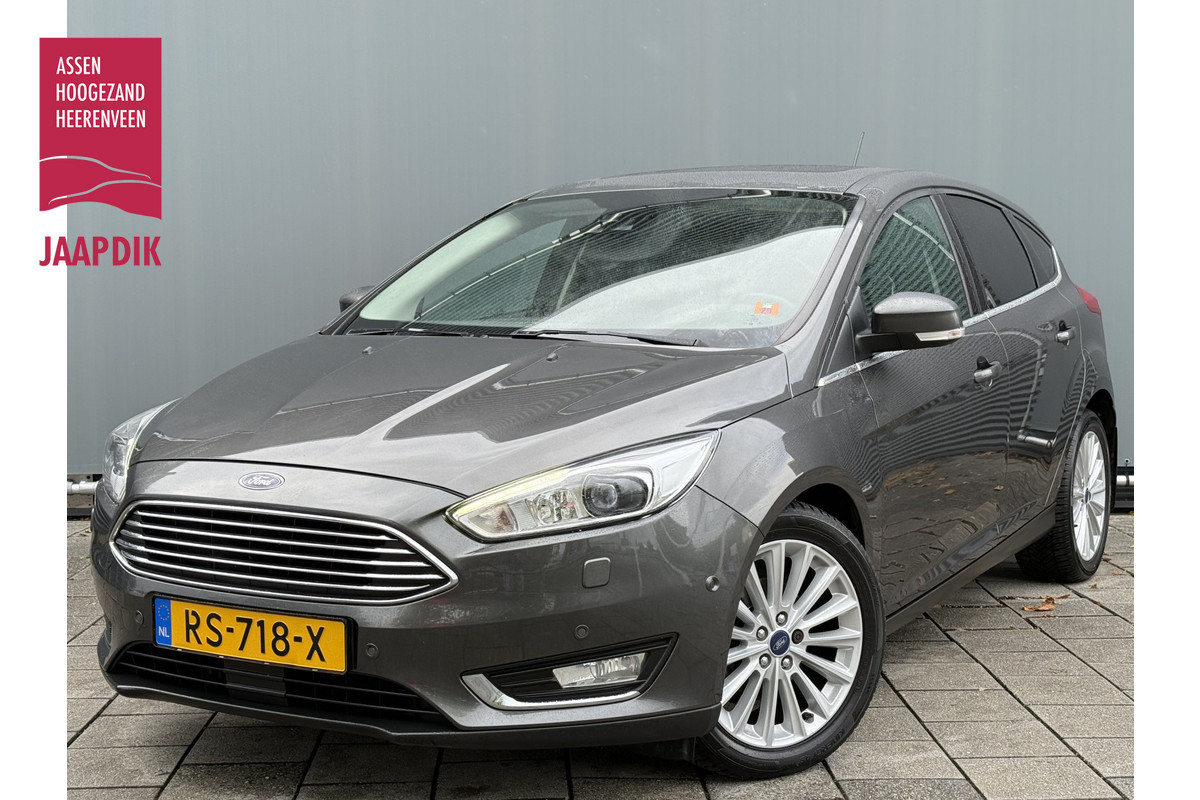 Ford Focus BWJ 2018 | 1.0 126PK Titanium | TREKHAAK | SCHUIFDAK | CLIMA | CAMERA | CARPLAY | NAVI | CRUISE | 2X PDC | Ford Focus BWJ 2018 | 1.0 126PK Titanium | TREKHAAK | SCHUIFDAK | CLIMA | CAMERA | CARPLAY | NAVI | CRUISE | 2X PDC |