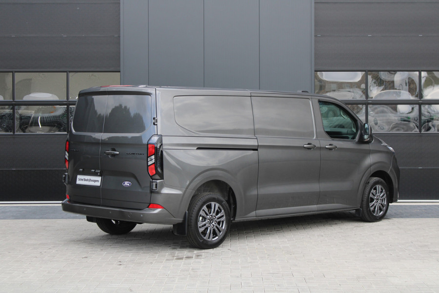 Ford Transit Custom 320 2.0 TDCI L2H1 Limited 150pk - Adaptive Cruise - Verwarmd stuur - Blind spot - Navigatie - Camera - Draadloos laden - Rijklaa Ford Transit Custom 320 2.0 TDCI L2H1 Limited 150pk - Adaptive Cruise - Verwarmd stuur - Blind spot - Navigatie - Camera - Draadloos laden - Rijklaa