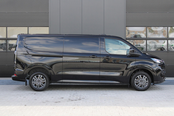 Ford Transit Custom 320 2.0 TDCI L2H1 Limited 150pk - 2x Schuifdeur - Adaptive Cruise - Verwarmd stuur - Blind spot - Navigatie - Camera - Draadloos Ford Transit Custom 320 2.0 TDCI L2H1 Limited 150pk - 2x Schuifdeur - Adaptive Cruise - Verwarmd stuur - Blind spot - Navigatie - Camera - Draadloos
