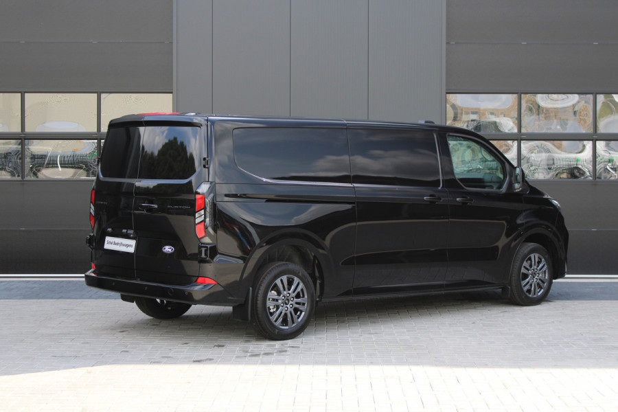 Ford Transit Custom 320 2.0 TDCI L2H1 Limited 150pk - 2x Schuifdeur - Adaptive Cruise - Verwarmd stuur - Blind spot - Navigatie - Camera - Draadloos Ford Transit Custom 320 2.0 TDCI L2H1 Limited 150pk - 2x Schuifdeur - Adaptive Cruise - Verwarmd stuur - Blind spot - Navigatie - Camera - Draadloos