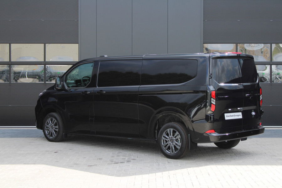 Ford Transit Custom 320 2.0 TDCI L2H1 Limited 150pk - 2x Schuifdeur - Adaptive Cruise - Verwarmd stuur - Blind spot - Navigatie - Camera - Draadloos Ford Transit Custom 320 2.0 TDCI L2H1 Limited 150pk - 2x Schuifdeur - Adaptive Cruise - Verwarmd stuur - Blind spot - Navigatie - Camera - Draadloos