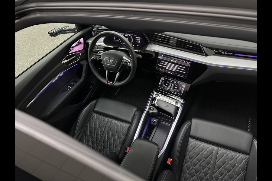 Audi e-tron Sportback S 503pk RS-Seats | 360 Camera | ACC | B&O | Panorama | Luchtvering | Head-Up | Camera-Spiegels | Keyless-Entry | SiamBeige Metallic | Trekhaak | ISO-Glas | 4-Zone Clima | Matrix-LED | Carplay | Rijklaar incl. BOVAG garantie | Black-Optic | Stuur-Verwarming | Sfeerverlichting |