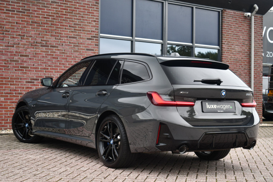 BMW 3 Serie Touring 330e xDrive M-Sport Pro LCI Dravitgrau Pano HUD el-zetels 19inch