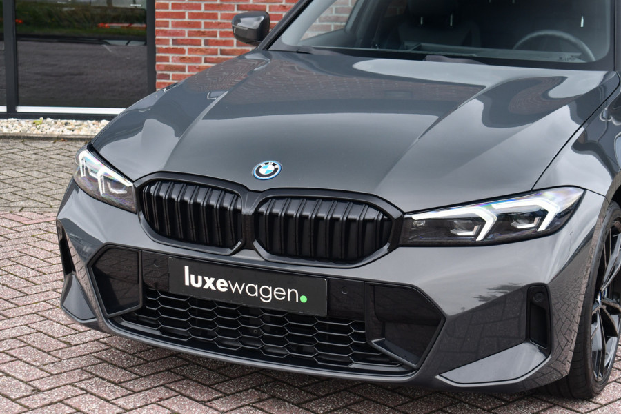 BMW 3 Serie Touring 330e xDrive M-Sport Pro LCI Dravitgrau Pano HUD el-zetels 19inch