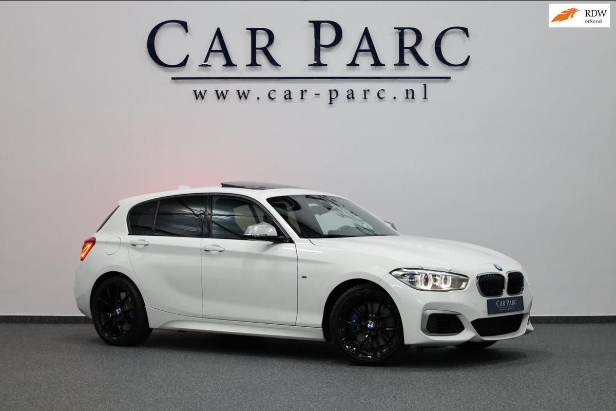 BMW 1-serie M140i xDrive LED/SCHUIFDAK/HARMAN/LEER+S.VERWARMING/19" LMV/CAM/CRUISE/ECC/12 MND GARANTIE! BMW 1-serie M140i xDrive LED/SCHUIFDAK/HARMAN/LEER+S.VERWARMING/19" LMV/CAM/CRUISE/ECC/12 MND GARANTIE!