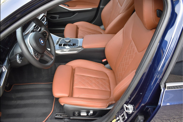 BMW 3 Serie Touring 330e xDrive 292 Pk Individual Pano Tartufo Leder H/K Memory Camera ACC 19 Inch