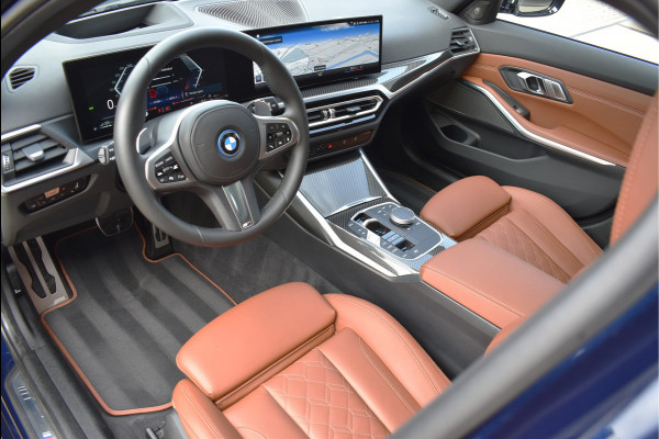 BMW 3 Serie Touring 330e xDrive 292 Pk Individual Pano Tartufo Leder H/K Memory Camera ACC 19 Inch