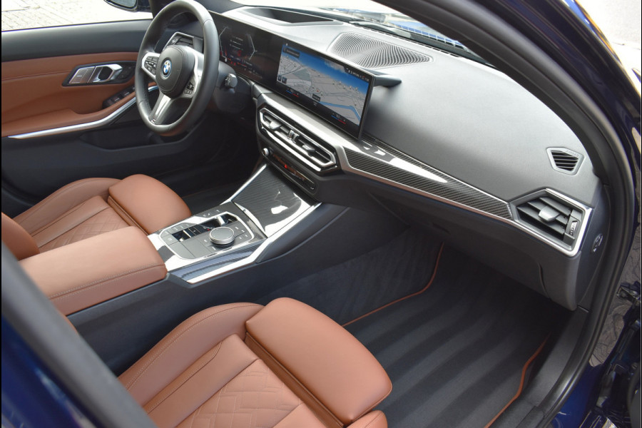BMW 3 Serie Touring 330e xDrive 292 Pk Individual Pano Tartufo Leder H/K Memory Camera ACC 19 Inch