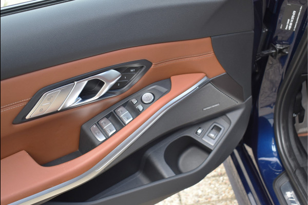 BMW 3 Serie Touring 330e xDrive 292 Pk Individual Pano Tartufo Leder H/K Memory Camera ACC 19 Inch