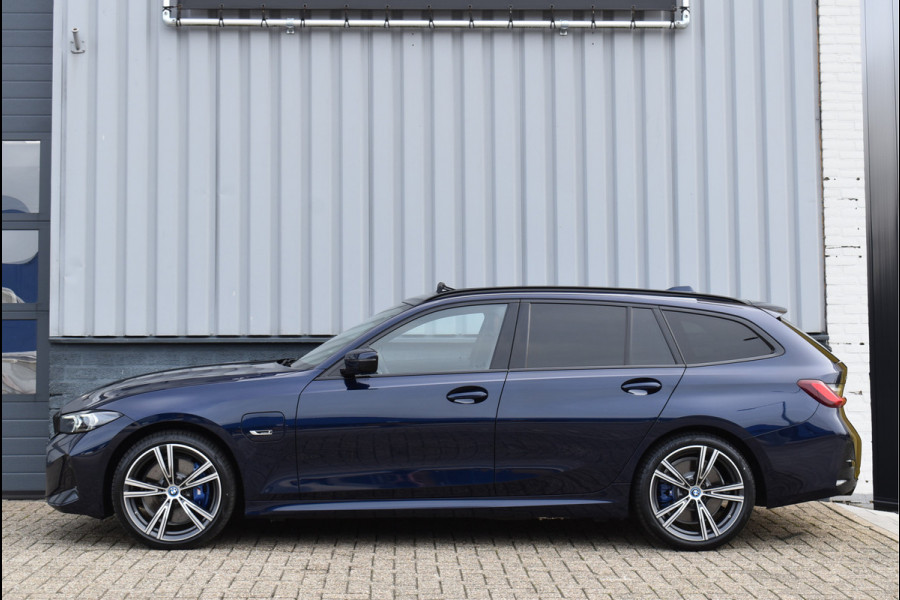 BMW 3 Serie Touring 330e xDrive 292 Pk Individual Pano Tartufo Leder H/K Memory Camera ACC 19 Inch