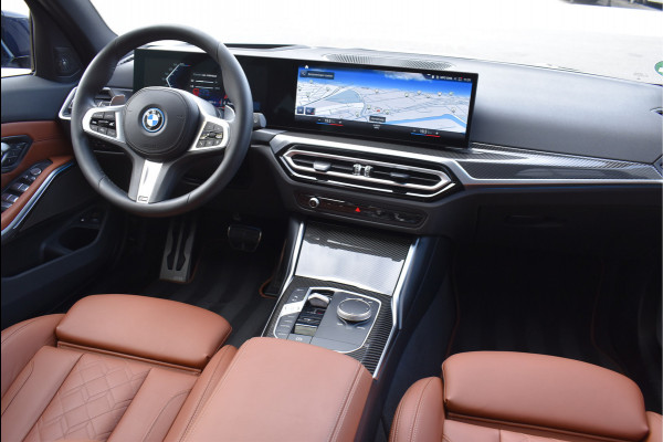 BMW 3 Serie Touring 330e xDrive 292 Pk Individual Pano Tartufo Leder H/K Memory Camera ACC 19 Inch