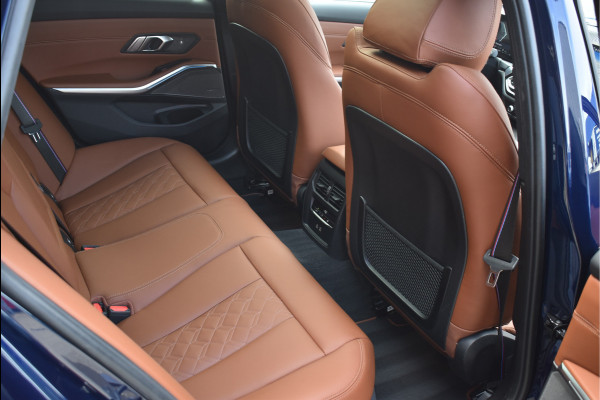 BMW 3 Serie Touring 330e xDrive 292 Pk Individual Pano Tartufo Leder H/K Memory Camera ACC 19 Inch