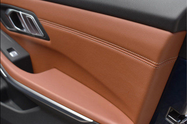 BMW 3 Serie Touring 330e xDrive 292 Pk Individual Pano Tartufo Leder H/K Memory Camera ACC 19 Inch