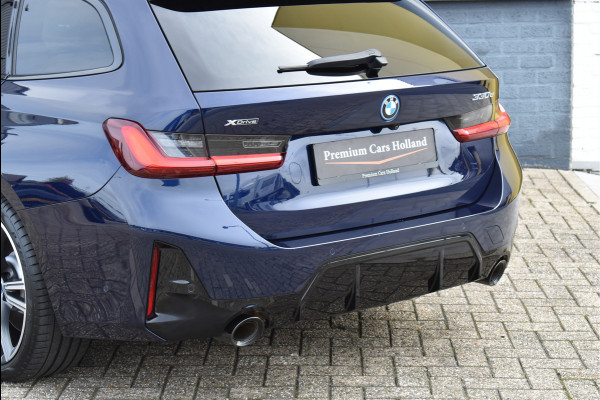 BMW 3 Serie Touring 330e xDrive 292 Pk Individual Pano Tartufo Leder H/K Memory Camera ACC 19 Inch