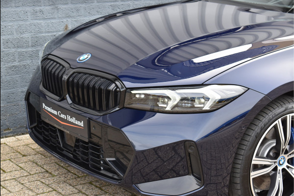 BMW 3 Serie Touring 330e xDrive 292 Pk Individual Pano Tartufo Leder H/K Memory Camera ACC 19 Inch