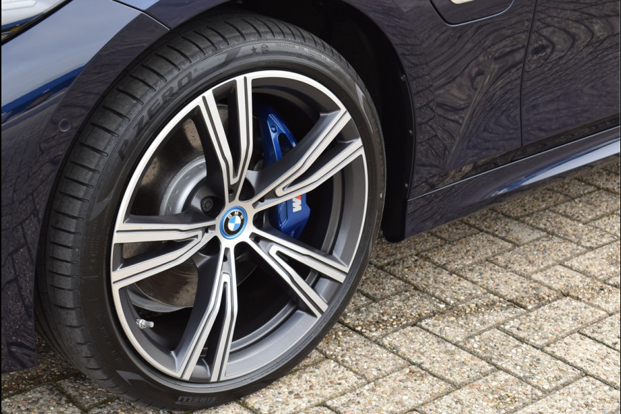 BMW 3 Serie Touring 330e xDrive 292 Pk Individual Pano Tartufo Leder H/K Memory Camera ACC 19 Inch