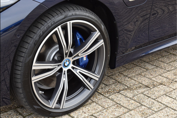 BMW 3 Serie Touring 330e xDrive 292 Pk Individual Pano Tartufo Leder H/K Memory Camera ACC 19 Inch