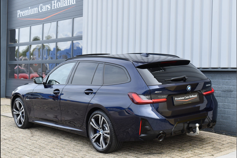 BMW 3 Serie Touring 330e xDrive 292 Pk Individual Pano Tartufo Leder H/K Memory Camera ACC 19 Inch