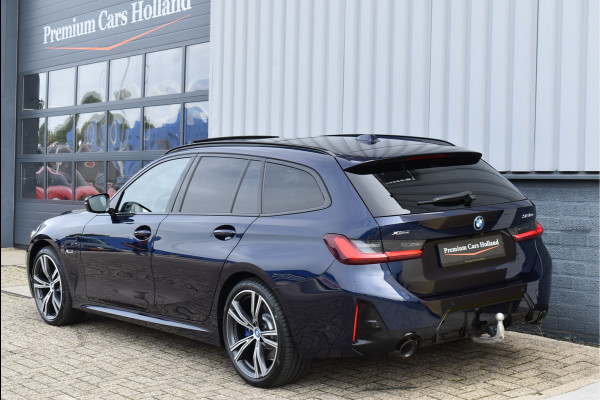 BMW 3 Serie Touring 330e xDrive 292 Pk Individual Pano Tartufo Leder H/K Memory Camera ACC 19 Inch
