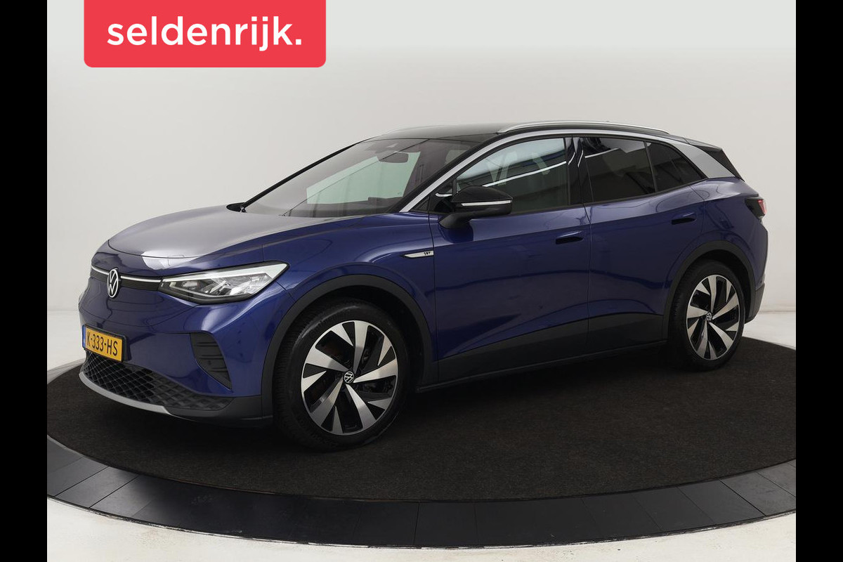 Volkswagen ID.4 First 77 kWh | Trekhaak | Sfeerverlichting | Camera | Navigatie | Stoelverwarming | Carplay | LMV 20 inch | LED | Cruise Control | Getint glas | Climate controle Volkswagen ID.4 First 77 kWh | Trekhaak | Sfeerverlichting | Camera | Navigatie | Stoelverwarming | Carplay | LMV 20 inch | LED | Cruise Control | Getint glas | Climate controle